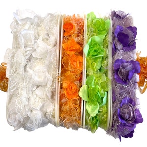 Blommig stretchig resårkant säljs metervis i orange, limegrönt, vitt, lila