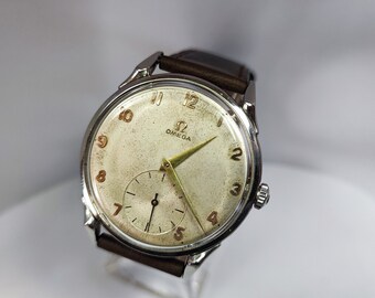 Reloj Omega de fabricación suiza - calibre 265 - años 50 - 1959