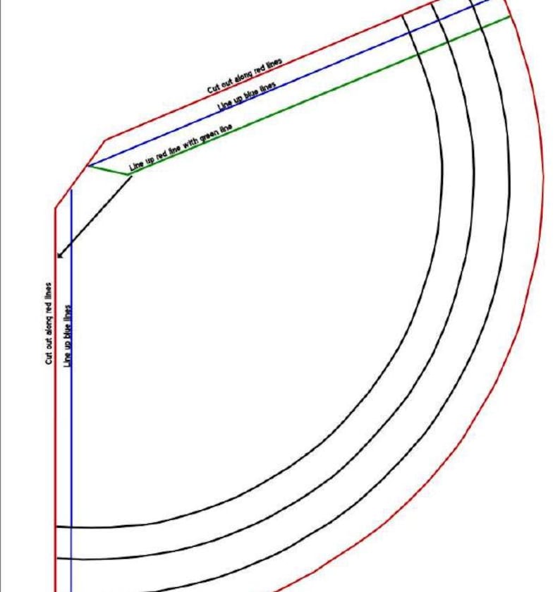 May include: A sewing pattern piece featuring a curved shape with red, blue, and green outlines. Text instructions include: Cut out along red lines, Line up blue lines, and Line up red line with green line. The design consists of black lines.