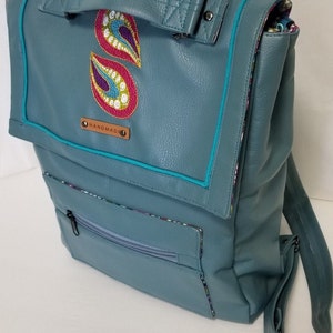 Large Faux Leather Backpack with lots of space to spare.
