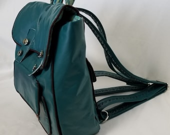 Faux Leather Satchel Backpack with lots of pockets inside and out.