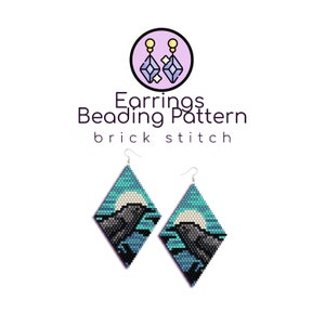 May include: Beaded earrings with a brick stitch pattern featuring a mountain scene with a moon and two ravens. The earrings are diamond shaped and have silver ear wires. The pattern is in shades of blue, black, and white.