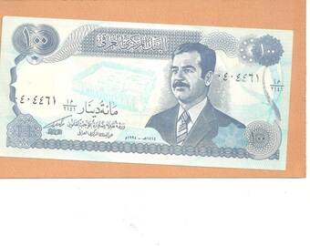 Le billet de 100 dinars irakiens avec l’effigie de Saddam Hussein a été mis en circulation en 1980 VINTAGE et n'a pas circulé