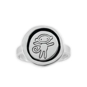 May include: A silver ring featuring a circular design with a black border. Inside the circle is a detailed outline of a monkey. The ring is a simple band style, perfect for everyday wear.