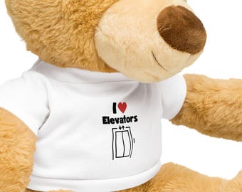 Osito de peluche con camiseta "Me encantan los ascensores"