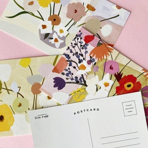 A set of brightly colored floral postcards by Lisa Rupp.