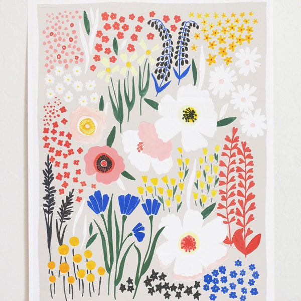 May include: A colorful floral print with a variety of flowers in shades of pink, red, white, blue, yellow, and green. The flowers are arranged in a random pattern on a light gray background.
