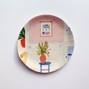 A colorful hand-painted illustration plate by Lisa Rupp.