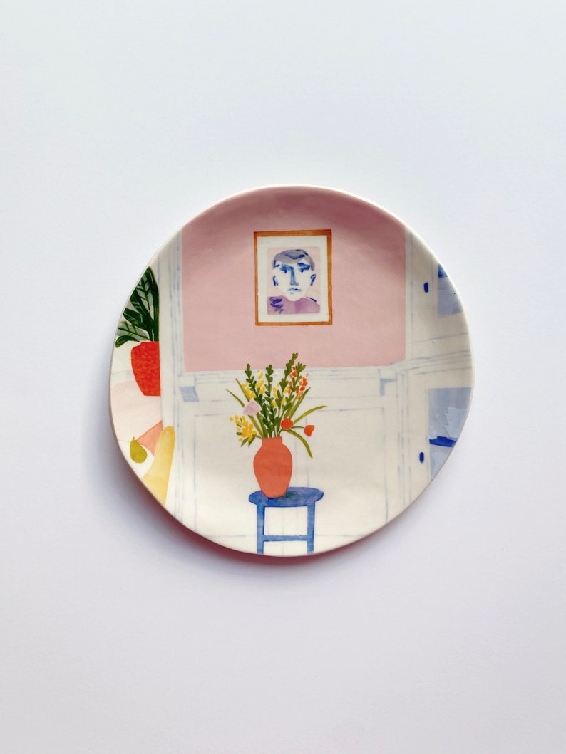 A colorful hand-painted illustration plate by Lisa Rupp.