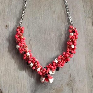 Knitted Beaded Statement Necklace: Coral, White, and Wood with Silver Chain