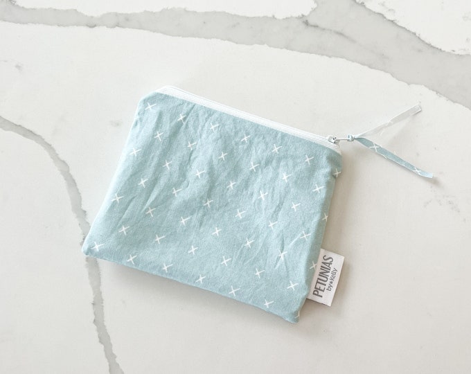 The ICKY Bag mini pouch - wetbag - PETUNIAS by Kelly - Indie Designer Fabric Series - pale blue cross