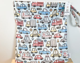 The ICKY Bag XL - wetbag - PETUNIAS by Kelly -  Indie Designer Fabric Series - light blue police fire truck vehicles