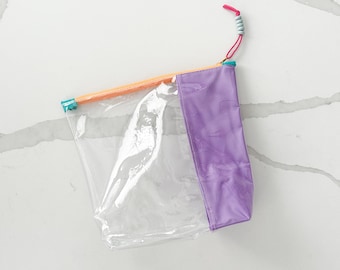 Clear Vinyl Zipper Pouch with Fabric Pop: Stylish Transparent Bag