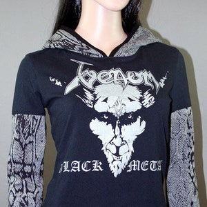 Pullover hoodie made from upcycled Venom shirt, modified for a flattering female fit and style. The hood and sleeves are in black and gray snake print. The hood is lined in black knit and the hem is coverstitched.