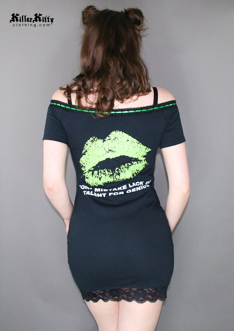 Off shoulder dress Type O Negative shirt, modified for a flattering female fit and style. This dress has black insertion lace on the shoulder with green, satin ribbon. Ribbon can be adjusted for a different look or removed. Black lace on the hem.