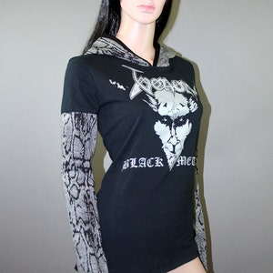 Pullover hoodie made from upcycled Venom shirt, modified for a flattering female fit and style. The hood and sleeves are in black and gray snake print. The hood is lined in black knit and the hem is coverstitched.