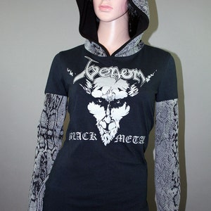 Pullover hoodie made from upcycled Venom shirt, modified for a flattering female fit and style. The hood and sleeves are in black and gray snake print. The hood is lined in black knit and the hem is coverstitched.