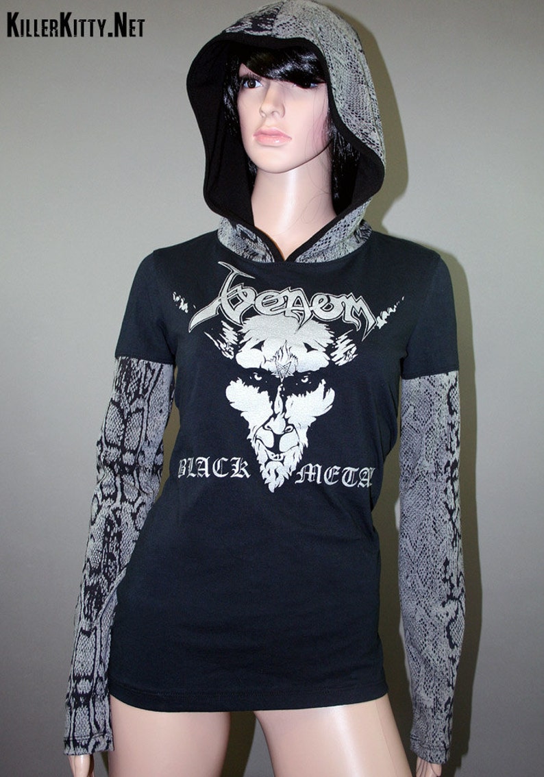 Pullover hoodie made from upcycled Venom shirt, modified for a flattering female fit and style. The hood and sleeves are in black and gray snake print. The hood is lined in black knit and the hem is coverstitched.