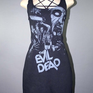 Tank dress made from upcycled Evil Dead t-shirt, modified for a flattering female fit and style. It has a black elastic pentagram neck, gathered waist with black, picot elastic trimming the arms and neck.  Order with or without pentagram.