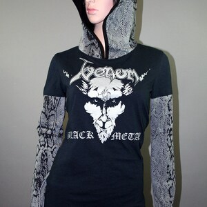 Pullover hoodie made from upcycled Venom shirt, modified for a flattering female fit and style. The hood and sleeves are in black and gray snake print. The hood is lined in black knit and the hem is coverstitched.