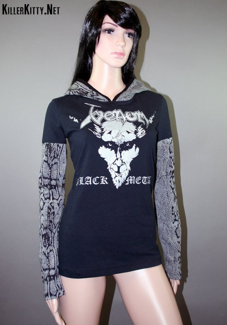 Pullover hoodie made from upcycled Venom shirt, modified for a flattering female fit and style. The hood and sleeves are in black and gray snake print. The hood is lined in black knit and the hem is coverstitched.