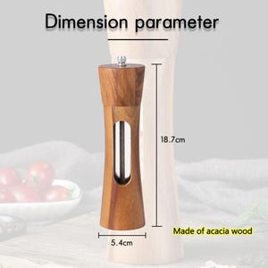 May include: A wooden salt and pepper grinder with a clear window to see the spice level. The grinder is 5.4 inches wide and 18.7 inches tall. Made of acacia wood.