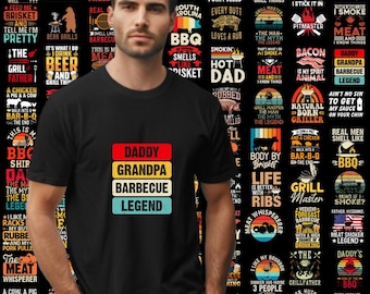 May include: A black t-shirt with a retro-style design featuring the text "Daddy Grandpa Barbecue Legend" in colorful boxes. The shirt is worn by a person with a beard and short hair.