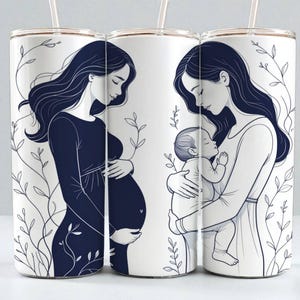 May include: White insulated tumbler with a straw, featuring a navy blue illustration of a pregnant person and a person holding a baby. Delicate botanical line art surrounds the figures, creating a serene and elegant design.