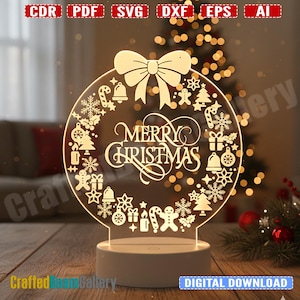 May include: A lighted Christmas decoration with a circular design. The design includes a bow, the words "Merry Christmas", and festive icons like bells, snowflakes, and gingerbread men. The base is white, and the text "DIGITAL DOWNLOAD" is visible.
