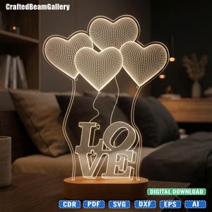 May include: A 3D-style illuminated lamp design featuring three heart-shaped balloons connected by thin lines to the word LOVE in block letters. The structure has a grid-like pattern throughout and sits on a smooth, oval-shaped wooden base.