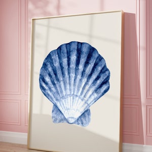 May include: A framed watercolor painting of a blue seashell on a white background.