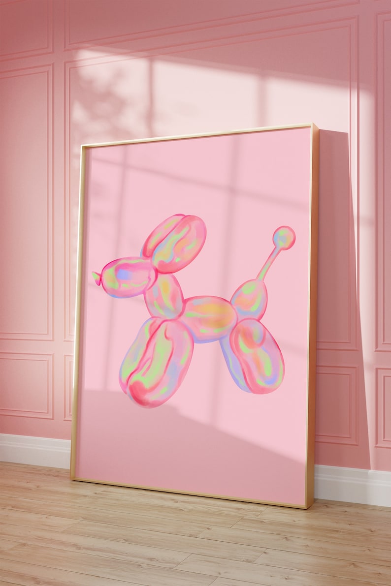 May include: A pink framed print of a colorful balloon animal shaped like a dog. The balloon animal is iridescent and has a light pink background.