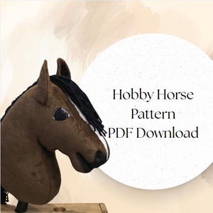 May include: A brown hobby horse head with black mane and white markings. The text "Hobby Horse Pattern PDF Download" is displayed on a white circle in the background. The horse head is made of soft fabric.