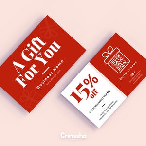 May include: Red gift card with white text that reads "A Gift For You" and "Business Name" with a website address. The card also has a white gift box icon with a QR code. The back of the card is white with red text that reads "15% off" and "ANY PURCHASES OVER $15".
