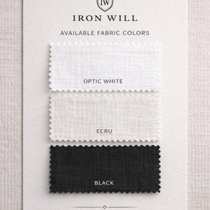 May include: A white card displays fabric color swatches from Iron Will. The swatches include Optic White, Ecru, and Black. The text "AVAILABLE FABRIC COLORS" is above the swatches.