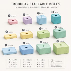 May include: Modular stackable boxes in twelve variations labeled A through L, featuring pastel colors including pink, purple, blue, yellow, and green. Each box has a central circular hole and specific dimensions listed in inches, with 1 = 100 mm.