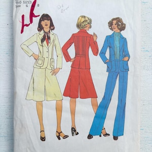May include: Vintage Simplicity sewing pattern #7672 featuring three women's suits in various colors. The pattern includes sizes 6 and 8. The top of the pattern is green with the Simplicity logo.