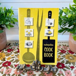 Libro de cocina de la época de Metropolitan patrocinado por Met Life Insurance Company, 1957