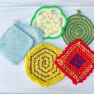May include: Five crocheted pot holders in different colors and patterns.  A light blue square, a yellow and brown circular one, a green circular one, a white and green flower-shaped one, and a red, orange, and yellow square one.