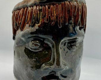 Beautiful Glazes on this guy! he’s heavy and sturdy! one of a kind!