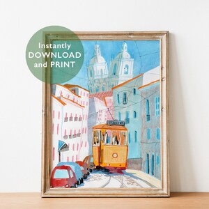 May include: A watercolor painting of a yellow tram traveling up a hill in Lisbon, Portugal. The tram is surrounded by colorful buildings and a church in the background.