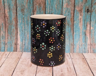 Porcelain cup black with multicolor flower design