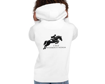 May include: White hooded sweatshirt with a black silhouette of a person riding a horse jumping over a fence. The text "I FLY WITHOUT WINGS" is printed below the image.