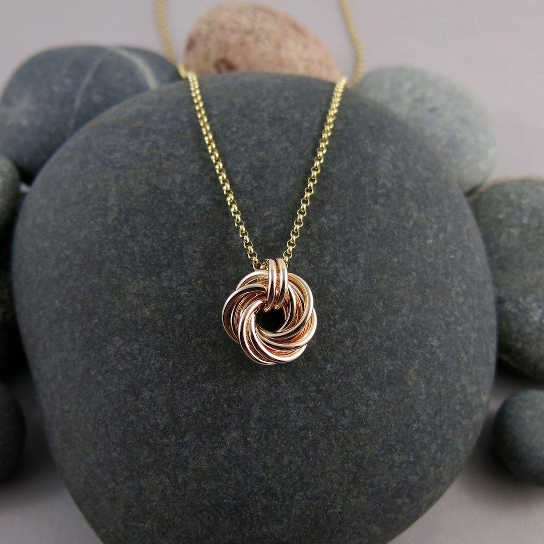 Elegant Gold Love Knot Necklace: A Timeless Symbol of Love