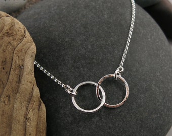 Silver Embrace Necklace • Entwined Textured Silver Rings