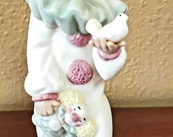 VIntage Nao Created by Lladro Figurine #1100 "A Bird In Hand" Handmade in Valencia, Spain 1989