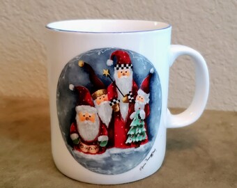 Taza de Papá Noel de la artista Elaine Thompson, 1997. Taza navideña de colección vintage para café, té o sopa.