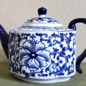 Bombay Company Floral Design Porcelain Teapot with Lid and Strainer For Tea and Hot Beverages