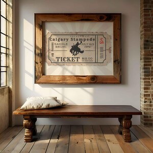 This vintage western ticket poster captures the grit and glory of bronc riding. Digital file, it makes a standout addition to man caves, bars, or farmhouse-style homes. A nostalgic gift for country lovers.
Vintage Rodeo Poster, Retro Calgary Stampede Ticket, Western Cowboy Print, Rodeo Bronc Rider, Bar Cart Decor, Americana Wall Art for Him