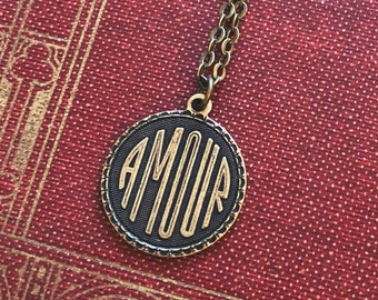 Amour French Love Pendant Necklace in Antique Brass